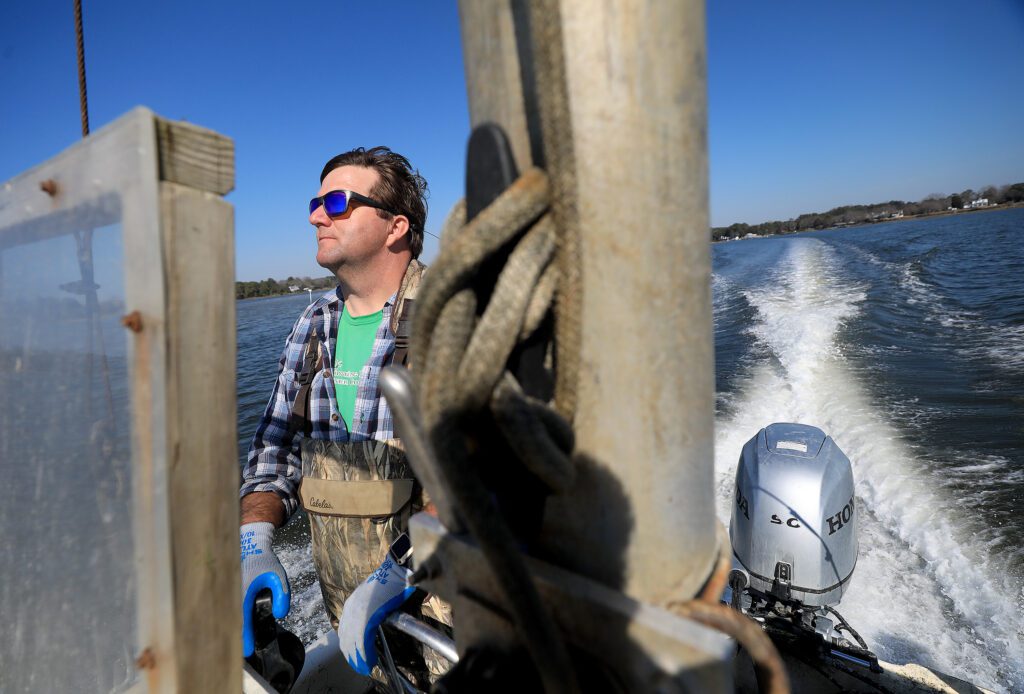 Tom Gallivan heading out to Shooting Point Oysters oyster beds on the Eastern Shore Wednesday March 10, 2021.