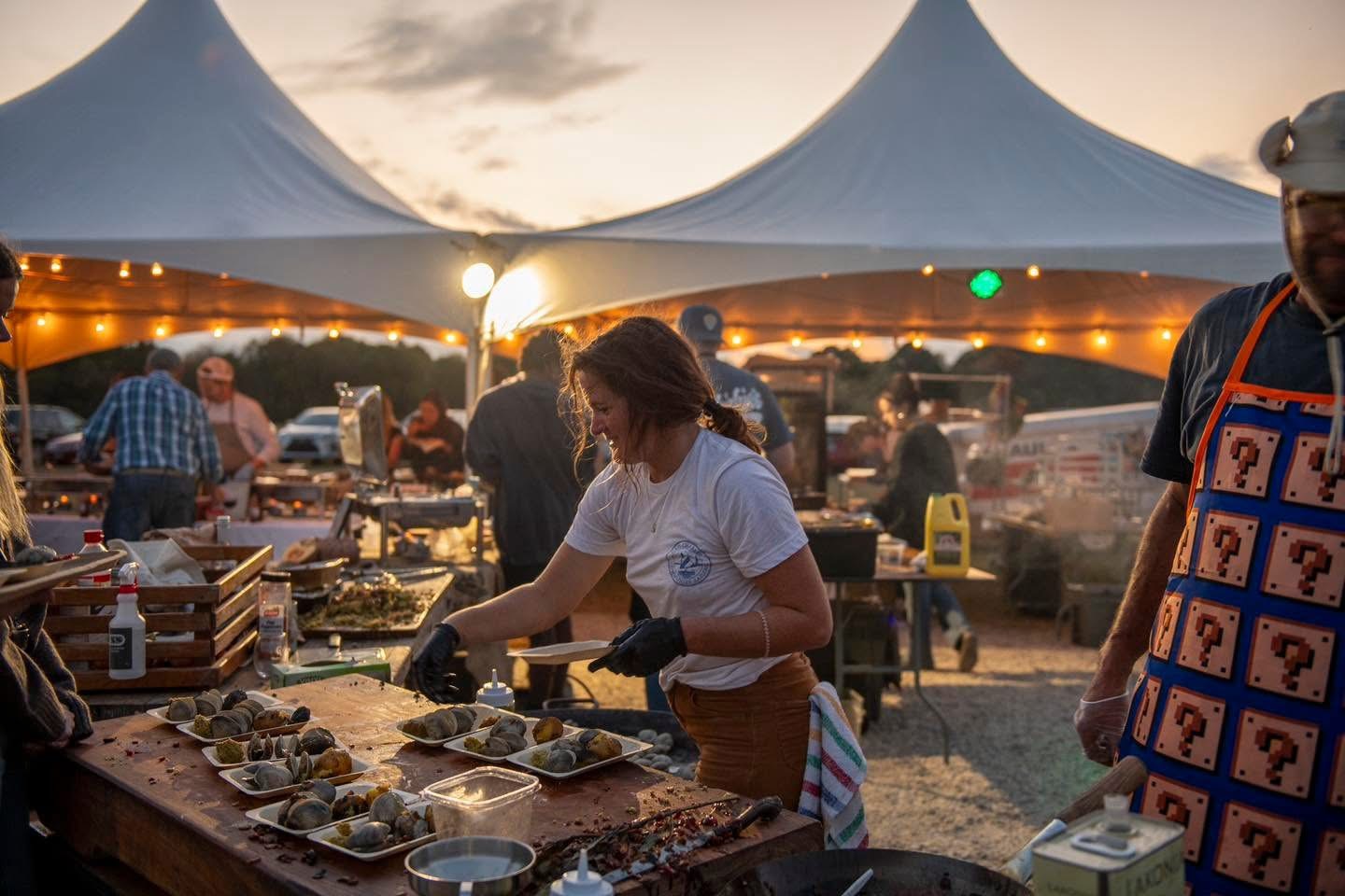 Chefs preparing food for A South You Never Ate event